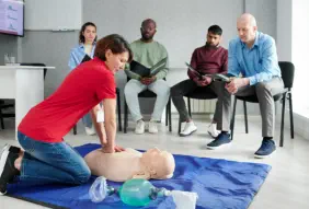 a woman doing CPR