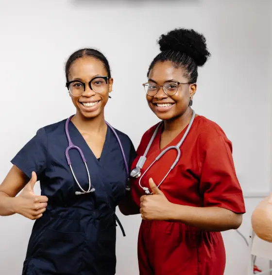 two caregiver smiling together