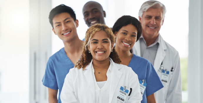 a group of healthcare proffessional smiling