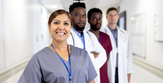 a group of healthcare proffessional smiling