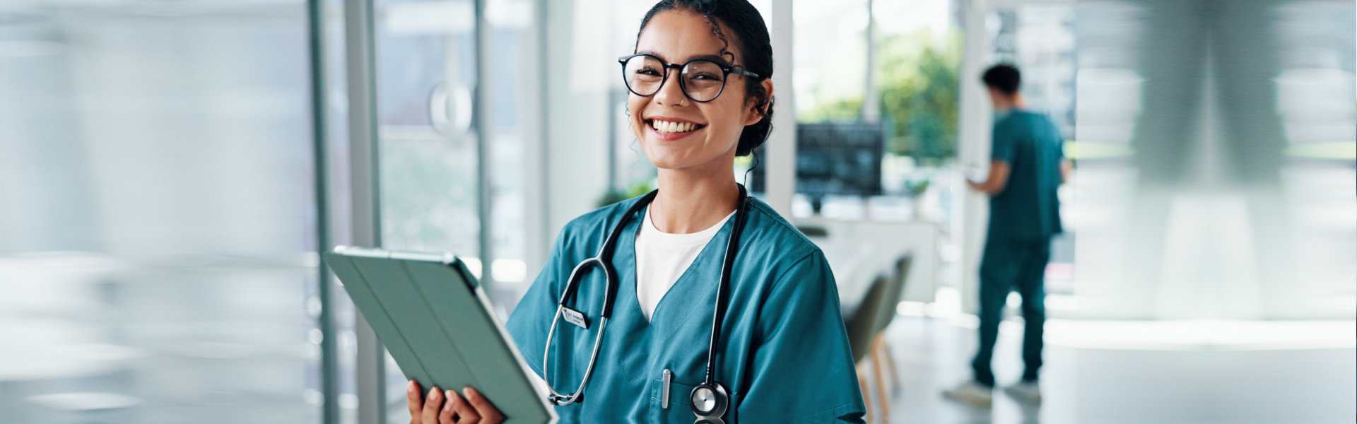 Nurse with tablet in hospital