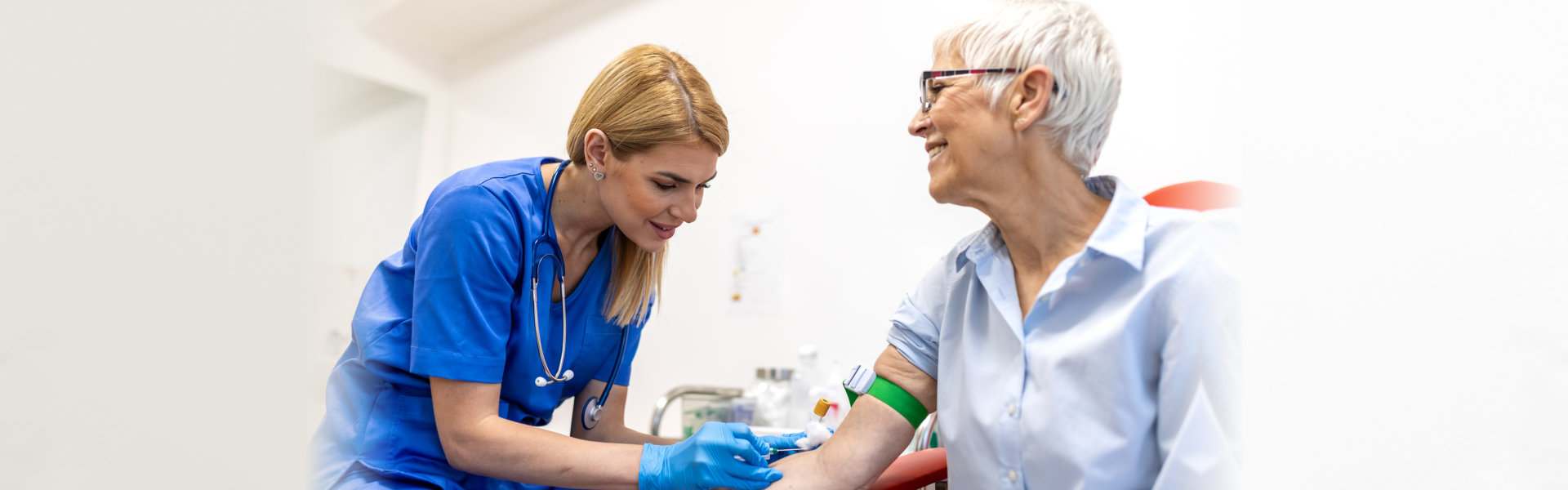 Nurse drawing blood