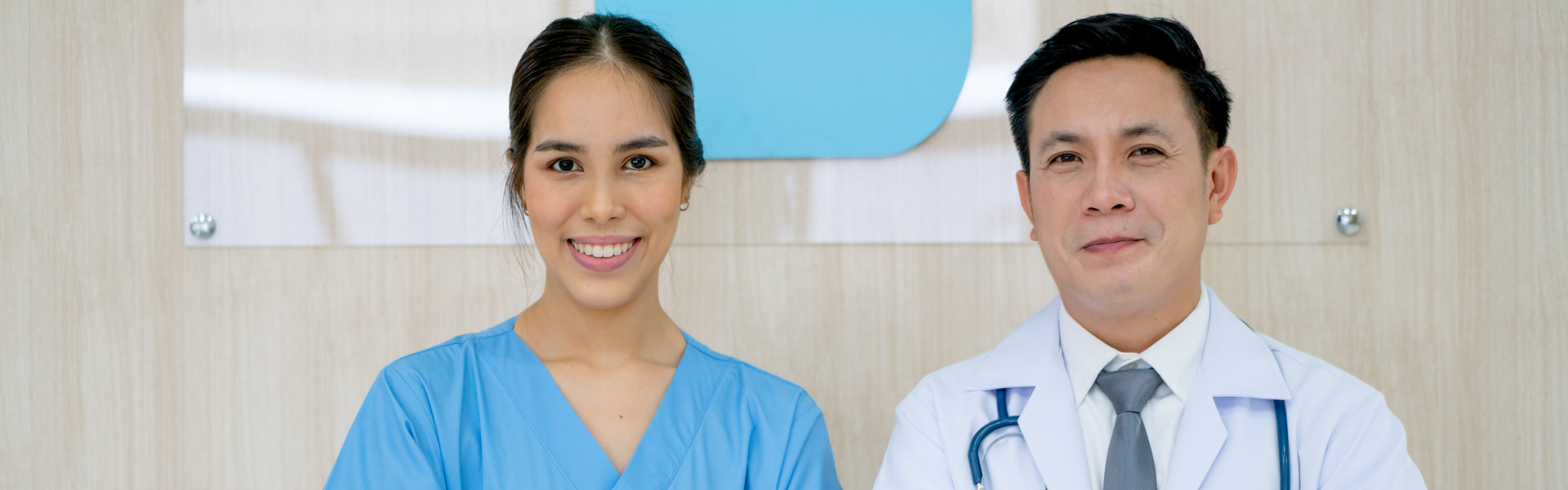 two medical staff smiling